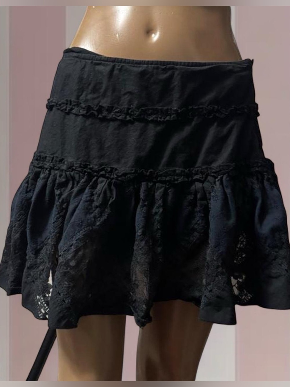 Black lace mini skirt with ruffles
